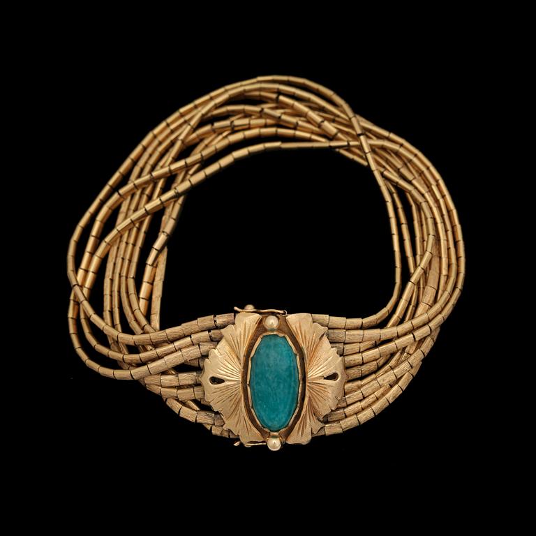 A turquoise bracelet.