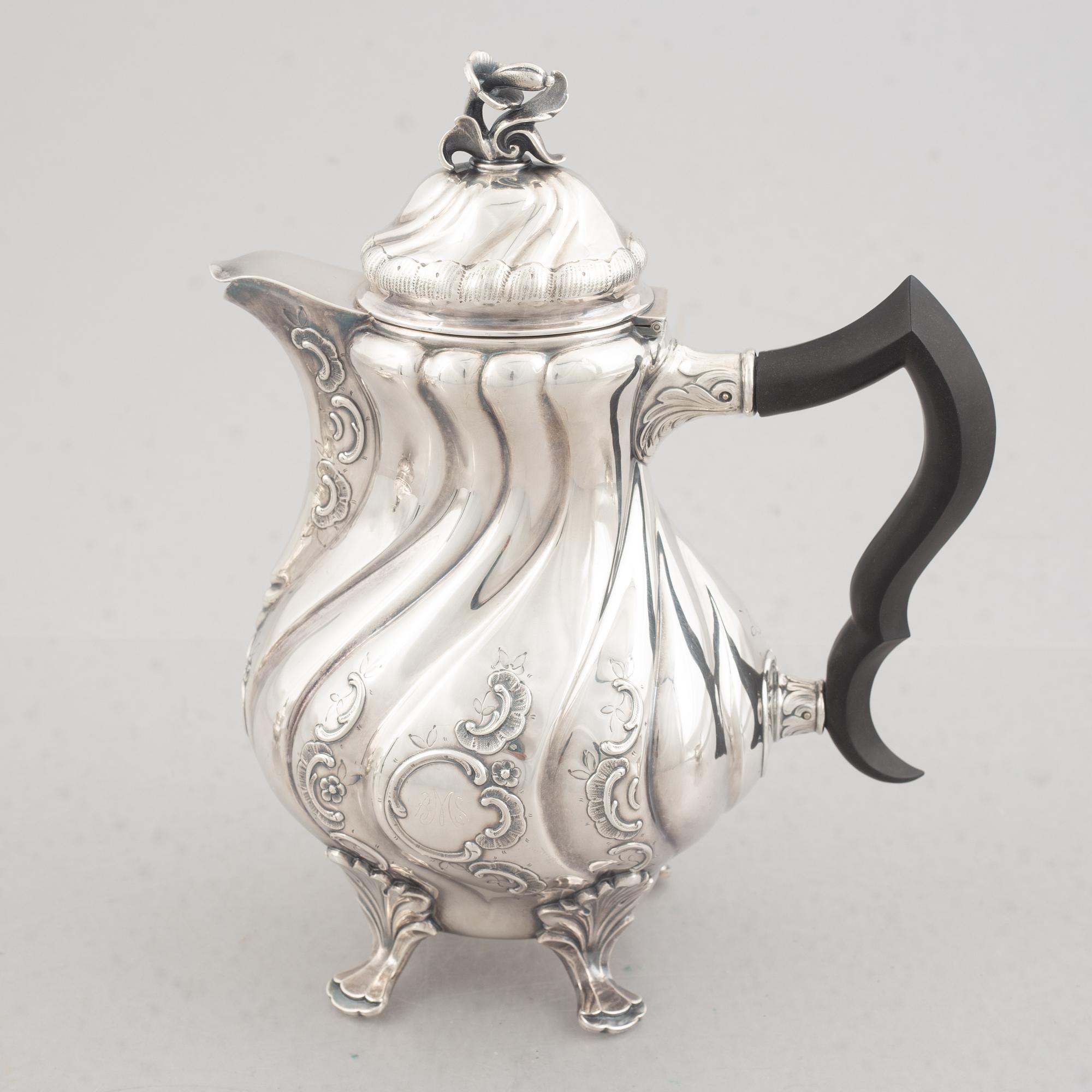 A Three Piece Silver Coffee Service, including mark of CG Hallberg, Stockholm 1961.