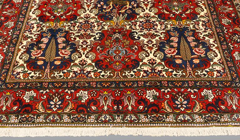 A carpet, Figural Baktiari, ca 305 x 205 cm.