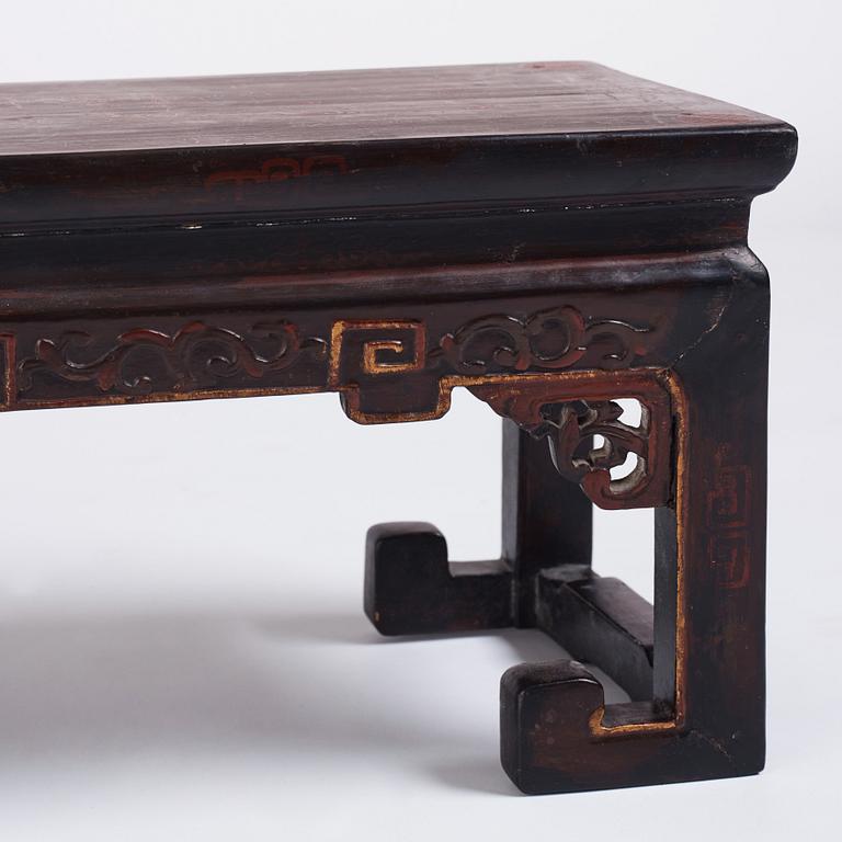 A Chinese lacquered Kang table, Qing dynasty.