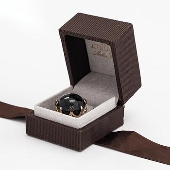 Pasquale Bruni, an 18K gold pendant with black diamonds ca. 0.60 ct in total and a obsidian.