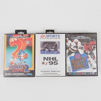 A "Sega Mega Drive" and nine games, 1990.s.