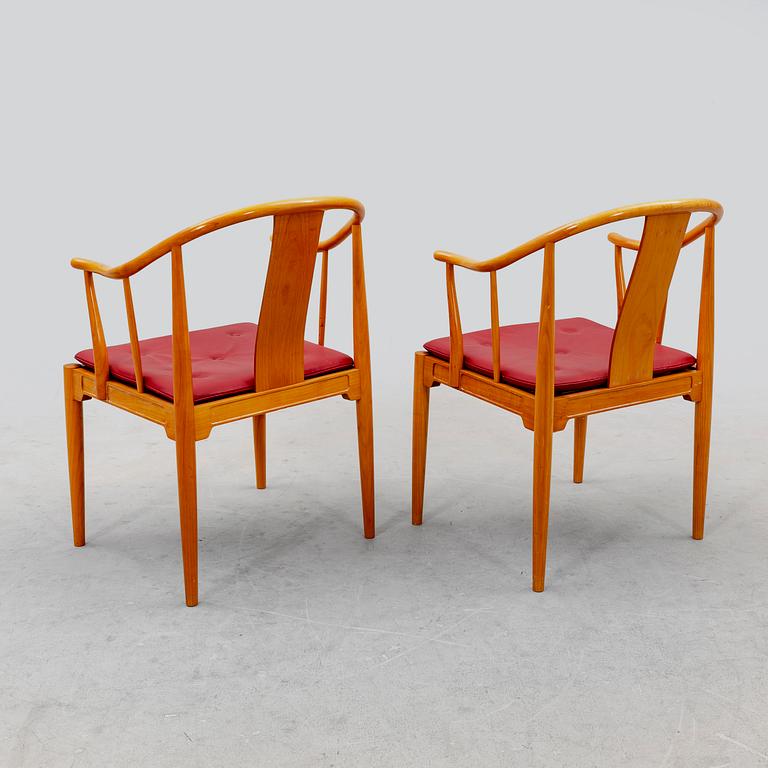 Hans J Wegner, a pair of "China" chairs for Fritz Hansen, Denmark, dated 1994.