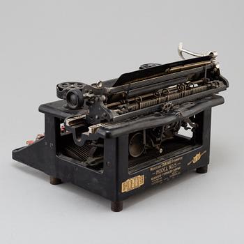 a Woodstock typewriter, early 20th century.