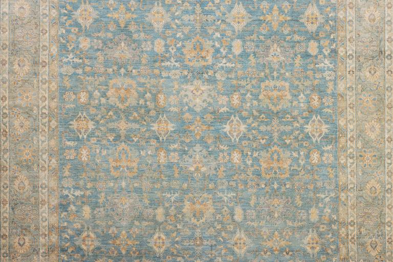 An Ushak carpet, c. 292 x 241 cm.