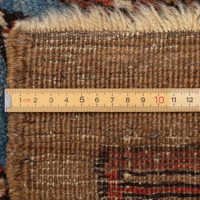 An antique Sarab rug, northwestern Iran, c. 213 x 107 cm.