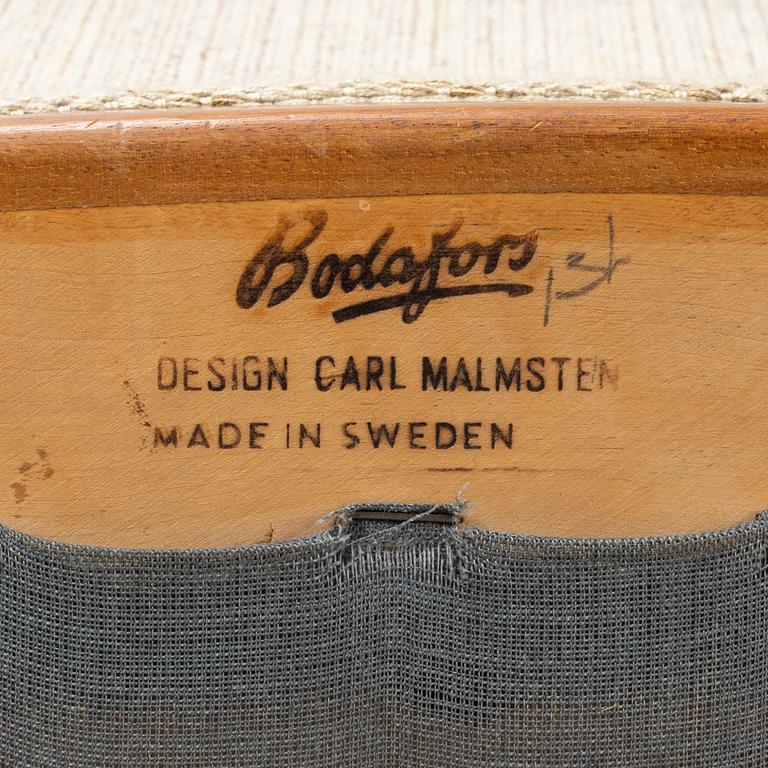 Carl Malmsten, a matched pair of easy chairs, second part of the 20th Century.