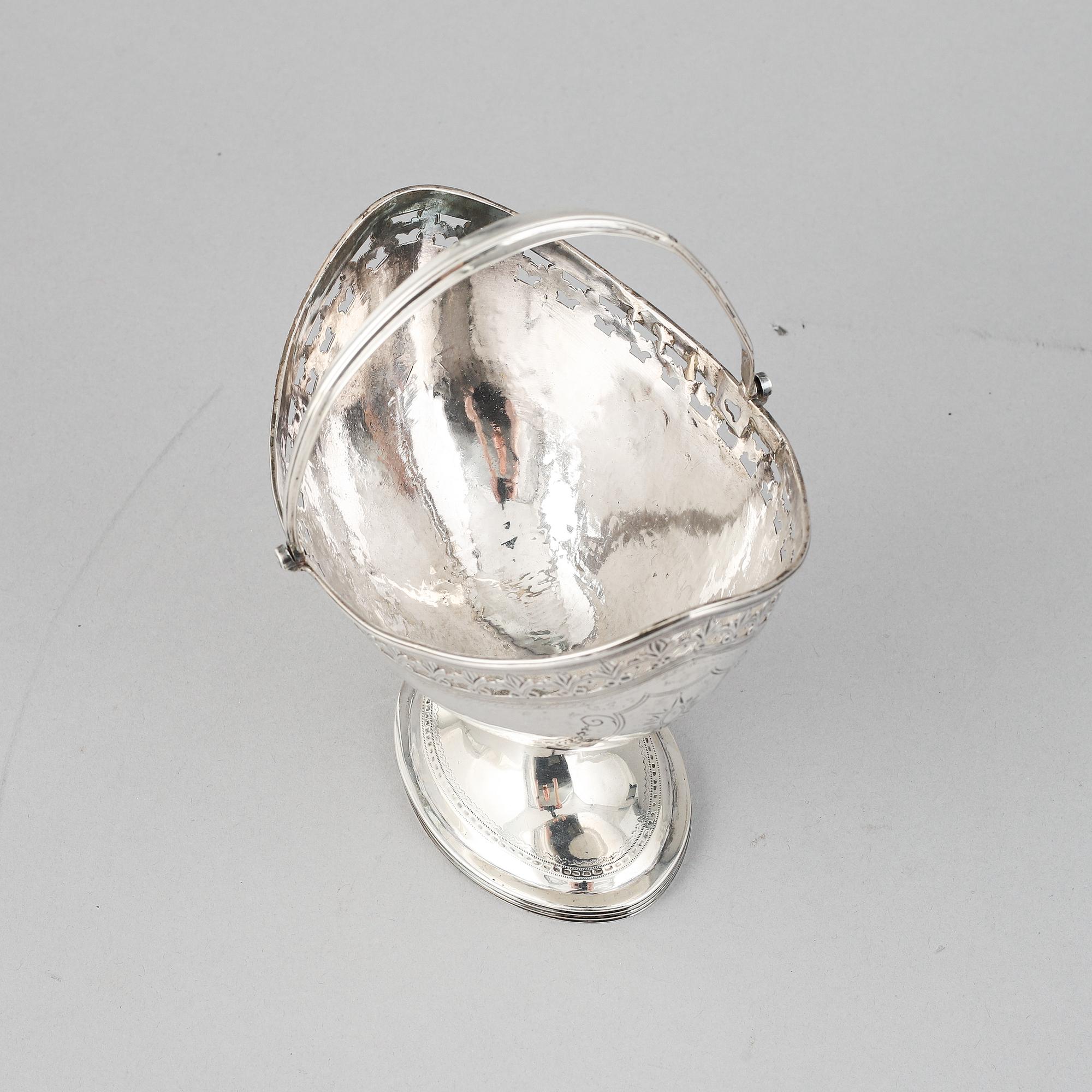A silver basket, mark of William Stroud, London 1809.
