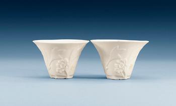 1363. A pair of blanc de chine libation cups, Qing dynasty, Qianlong (1736-95). (2).