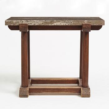 Axel Einar Hjorth, a "Sandhamn" stained pine and granite top table, Nordiska Kompaniet, Sweden 1930's.