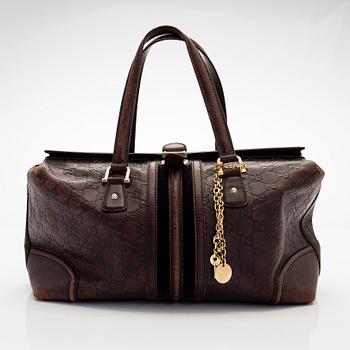Gucci, A 'Boston' bag.