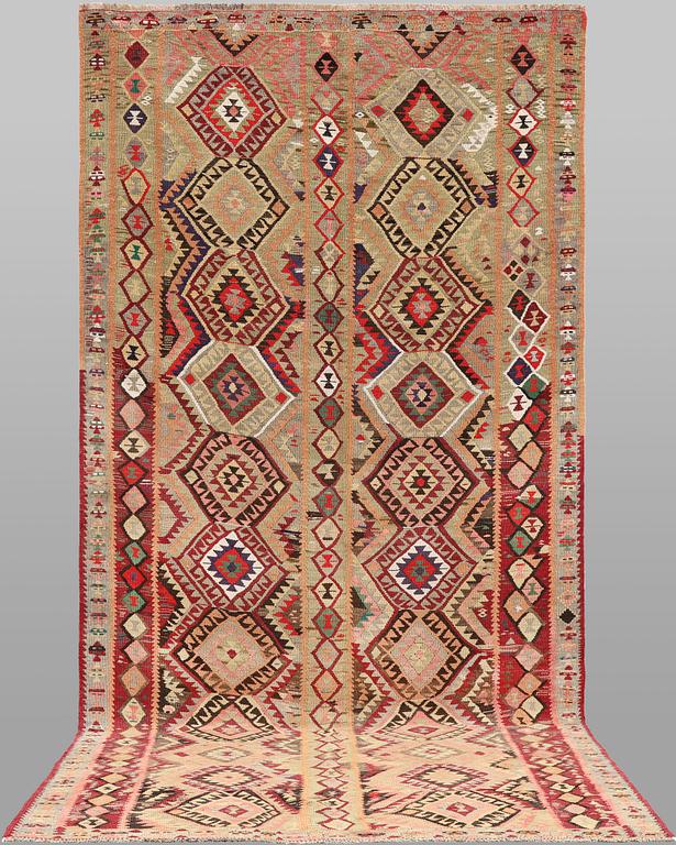 A Nomad Kelim Kord carpet, 387 x 185 cm.