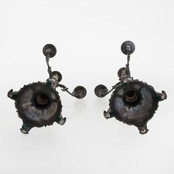A pair of silver candelabra, maker marks of Carl Johan Tegelsten, Saint Petersburg 1850.