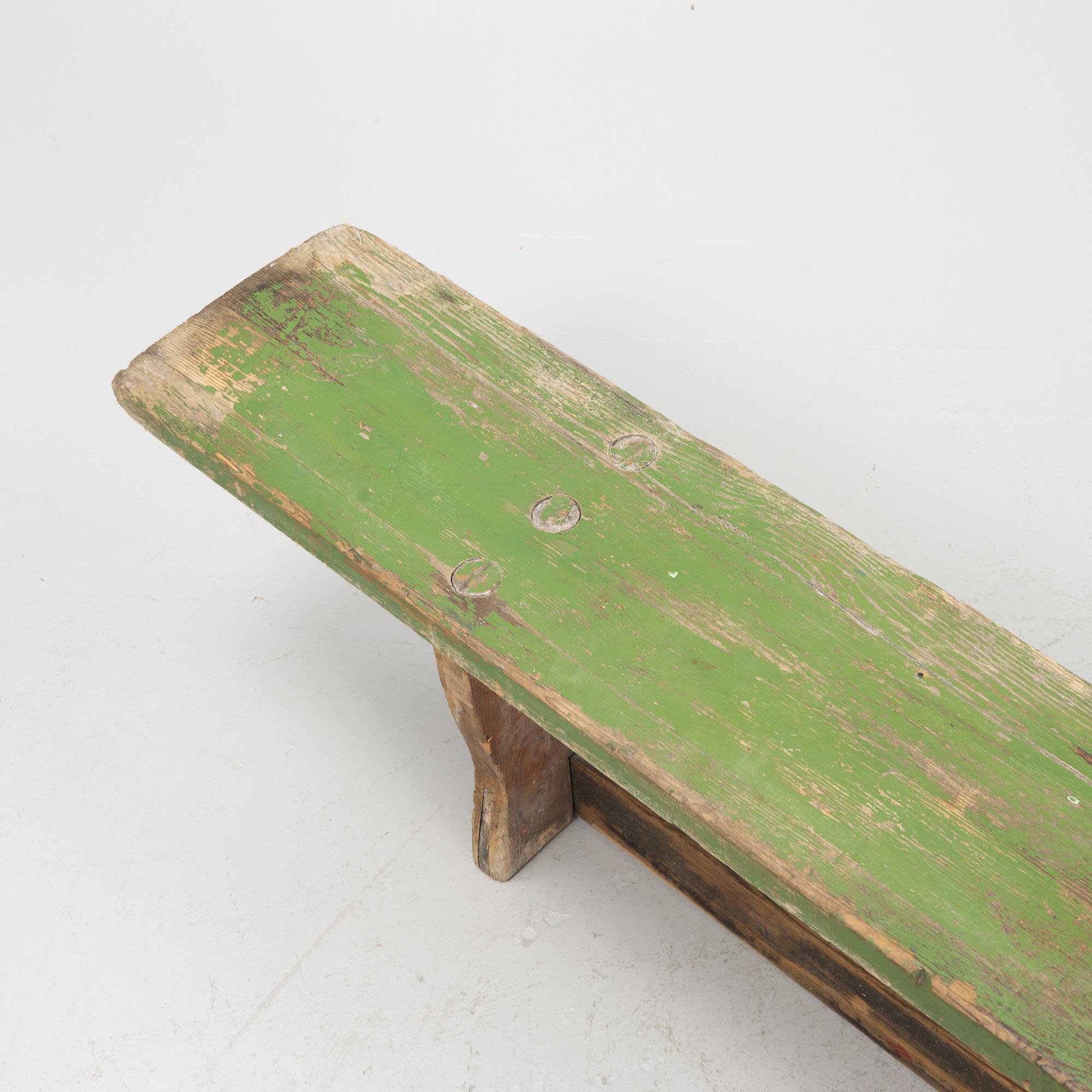 A painted bench, 20th Century.