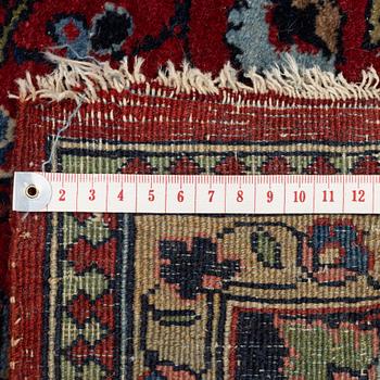 A Kashan rug, c. 208 x 138 cm.