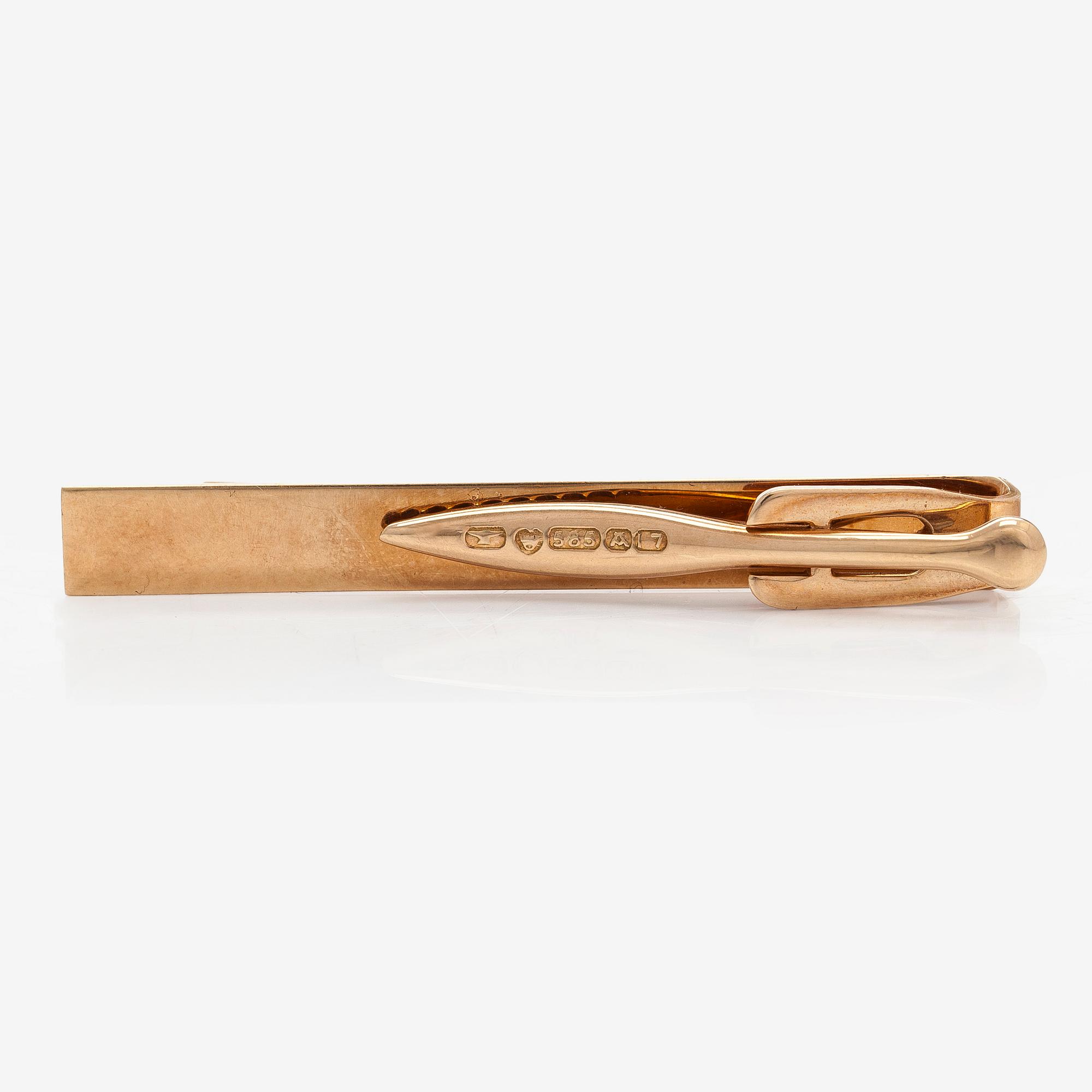 Elis Kauppi, A 14K gold tie pin with hematites. Kupittaan Kulta Turku 1962.