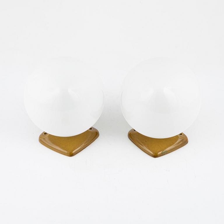 Gunnar Nylund, a pair of glass and porcelain wall lights from the 'Lyx' series, Ifö Electric, Sweden, 1960's.