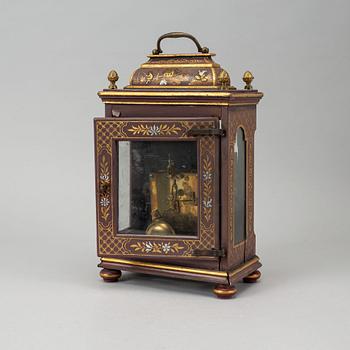 An 18th century table clock.