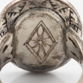 Silver ring with coral and marcasites and with black details.