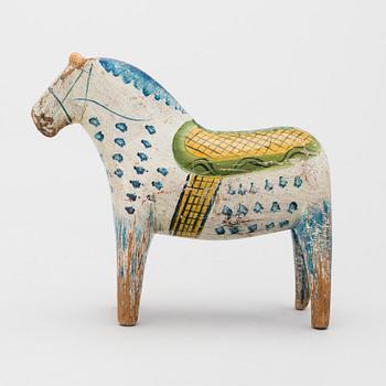 A painted folk art dala horse first half of the 20th century.