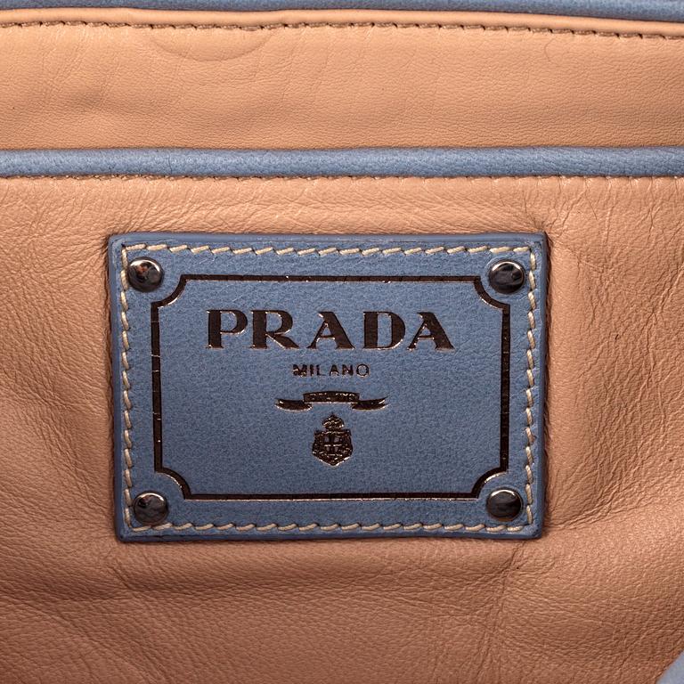 PRADA, a pale blue leather purse.