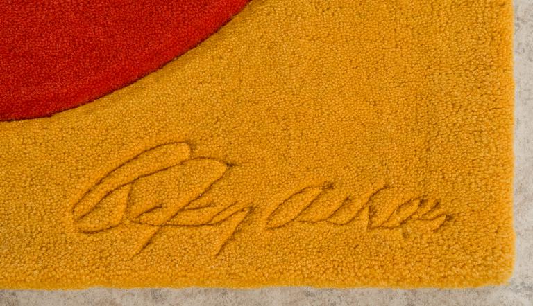 Robert Indiana, Signed R Indiana and numbered 139/300 on label verso and signed R Indiana in the carpet. Hand tufted carpet 183 x 183 cm.