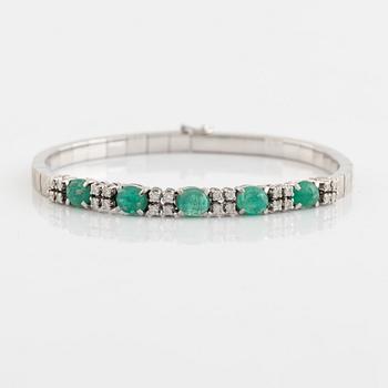 Bracelet, white gold with cabochon-cut emeralds and brilliant-cut diamonds.