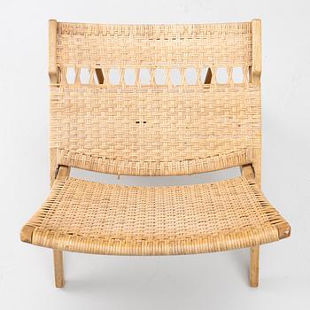 Hans J. Wegner, A folding chair, JH 512, Johannes Hansen, Denmark.