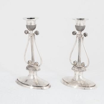 A pair of Swedish silver Empire candlesticks, mark of Gustaf Folcker, Stockholm 1814.