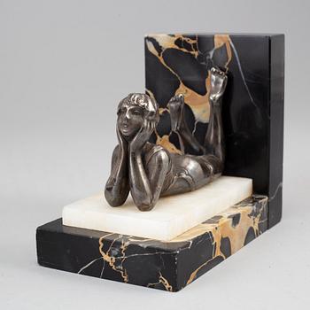 A pair of marble and silver plate art déco book ends.