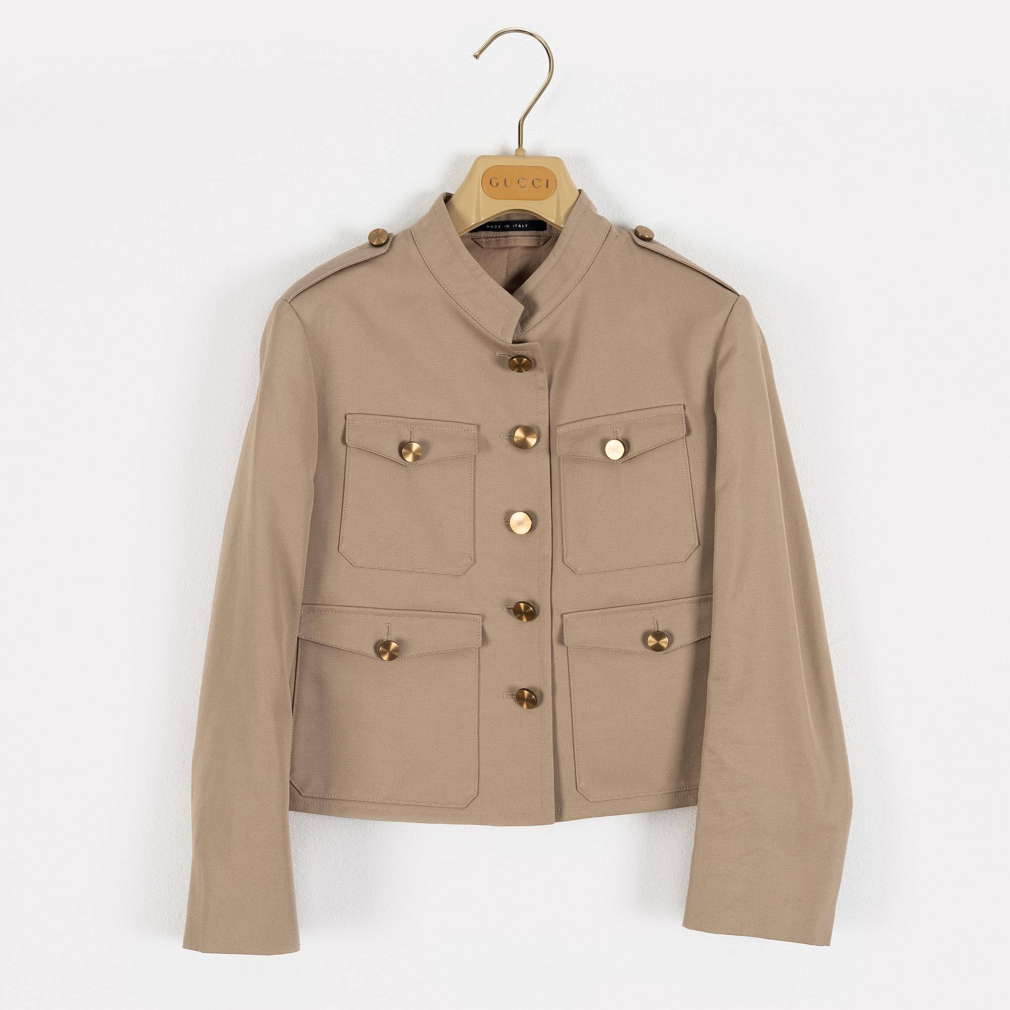 Gucci, a beige cotton jacket, Italian size 40.