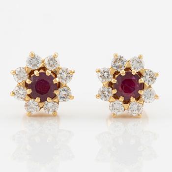 Earrings with rubies and brilliant-cut diamonds.