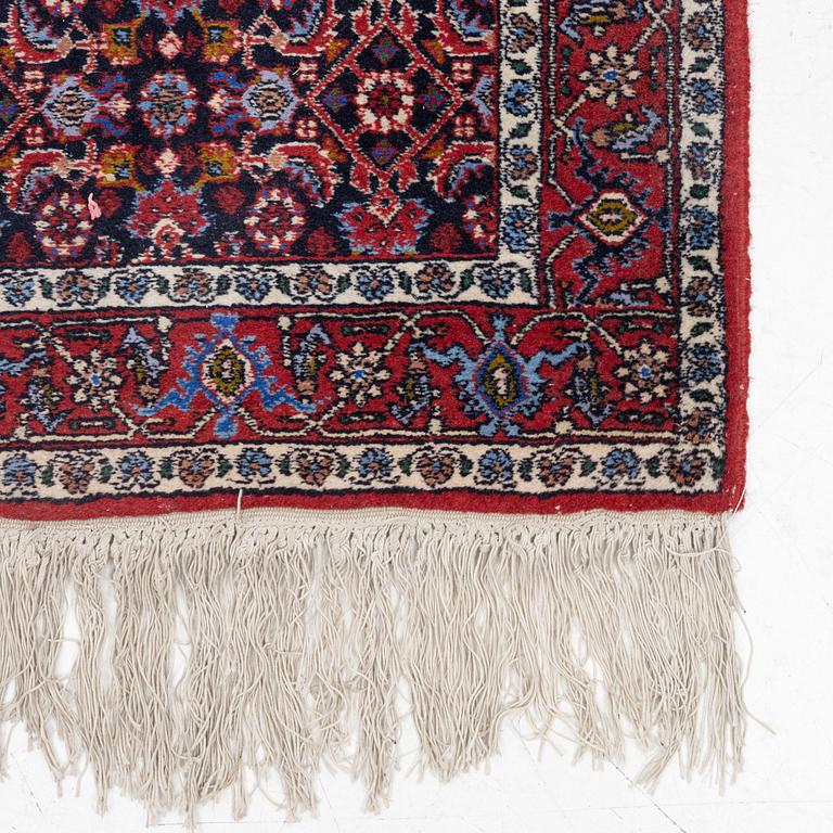 A runner carpet, c. 296 x 93 cm.