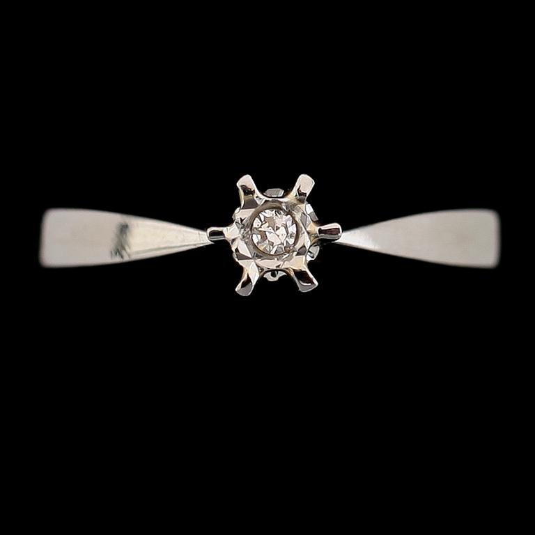 RING, 18 k vitguld med diamant 0.02 ct WSI, 1900-talets andra hälft. Total vikt ca 2 gram.