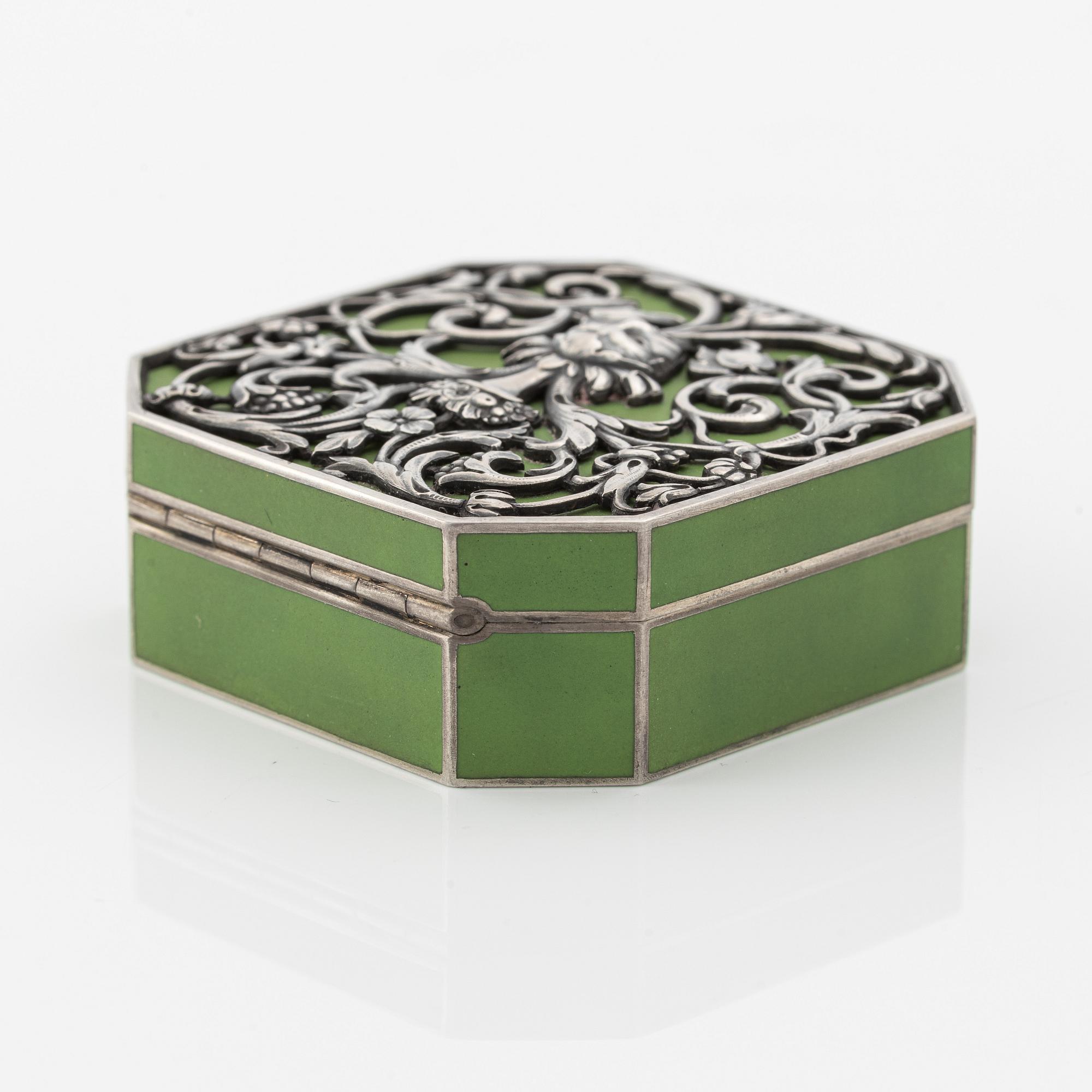 A rare silver and opaque green enamel pill box, Moscow 1912-1917.