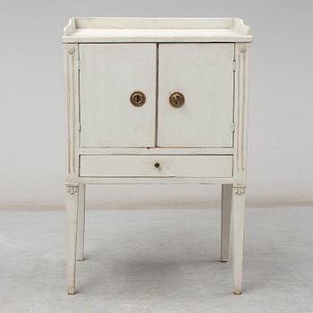 A later part of the 19th century Gustavian style bedside cabinet.