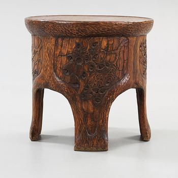 A Gustav Fjaestad Art Nouveau carved pine table by Adolf Swanson, Arvika, Sweden 1908.