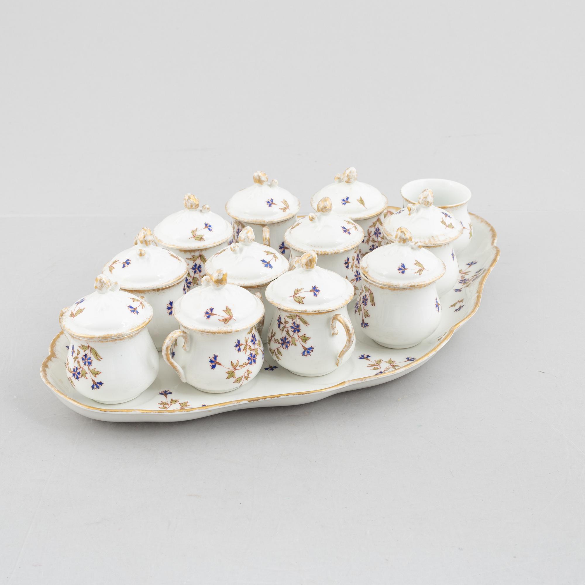 Tray with twelve creamers, porcelain, Limoges WG & Co, France.