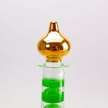 A signed handpainted glass decanter by Anne Nilsson later part of the 20th century.