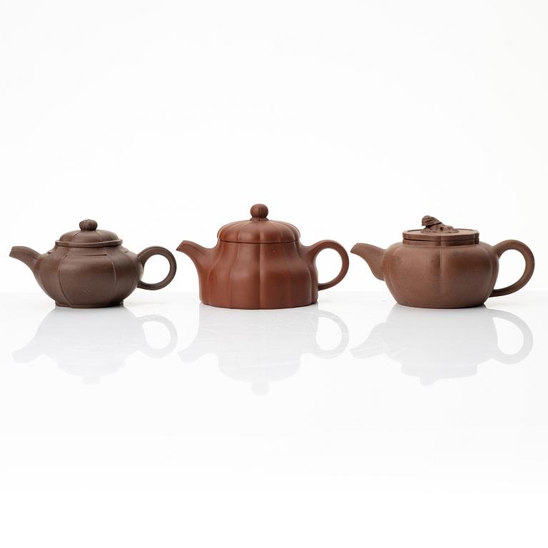 A group of three yixing teapots, China, 1980s.