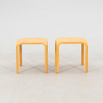 Alvar Aalto, stools/side tables, a pair model X601 Artek, latter half of the 20th century.