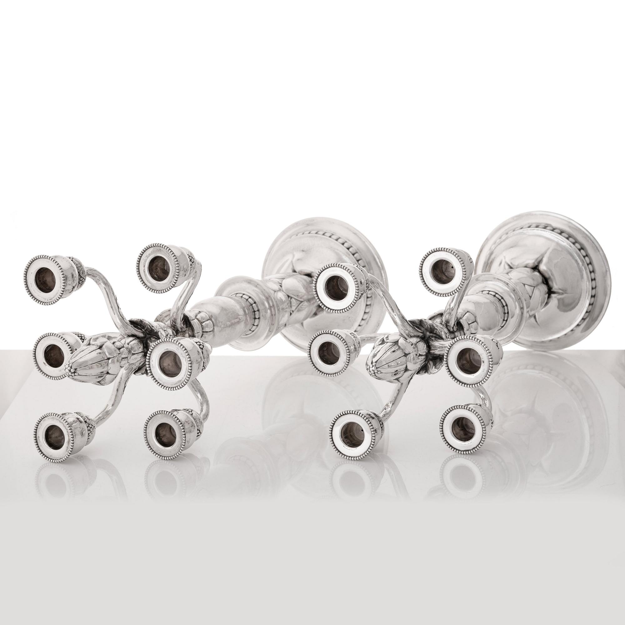 Georg Jensen, a pair of six lights silver candelabra, Copenhagen 1920, design nr 38.