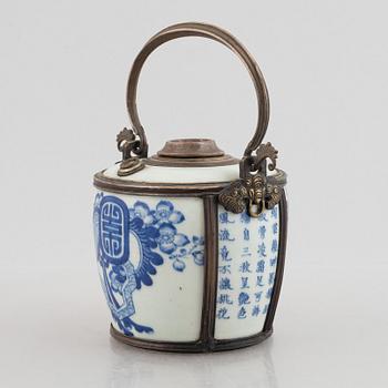A metal mounted porcelain ewer, late Qing dynasty.