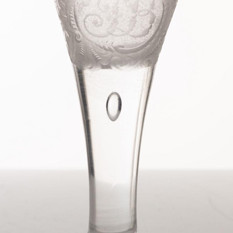 A presumably German engraved and gilt rococo glass, mid 18th century.
