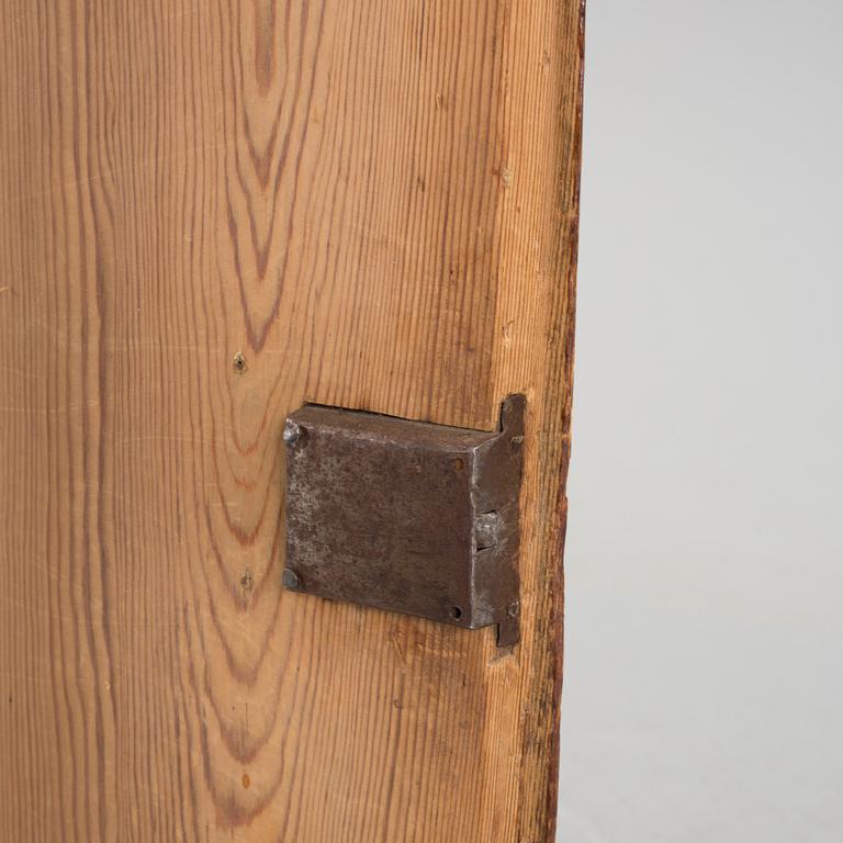 A folk corner cabinet dated 1779.