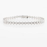 Tennis bracelet, 18K white gold with fancy-cut diamonds.