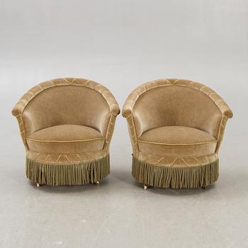 A pair of late 19th century easy chairs.