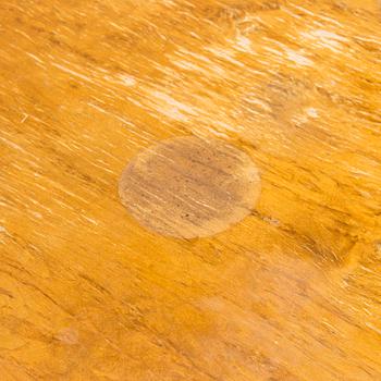 A 1920s Carelian birch veneered table.