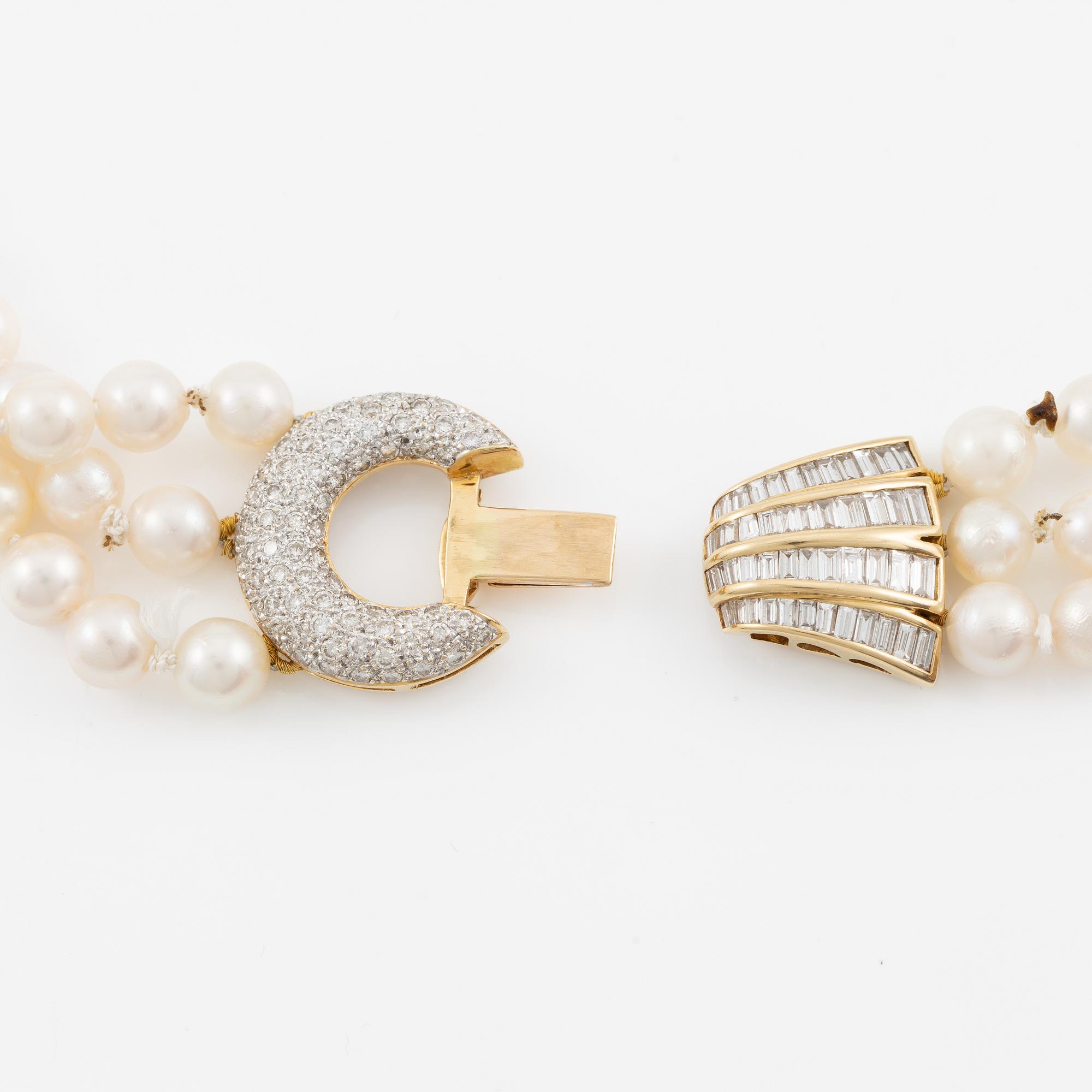 Pearl necklace, three strands of cultured pearls, clasp in 18K gold set with baguette and brilliant-cut diamonds.