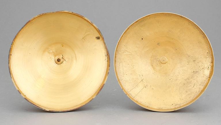 LJUSSTAKAR, ett par, empire, förgylld brons, 1800-talets första hälft.